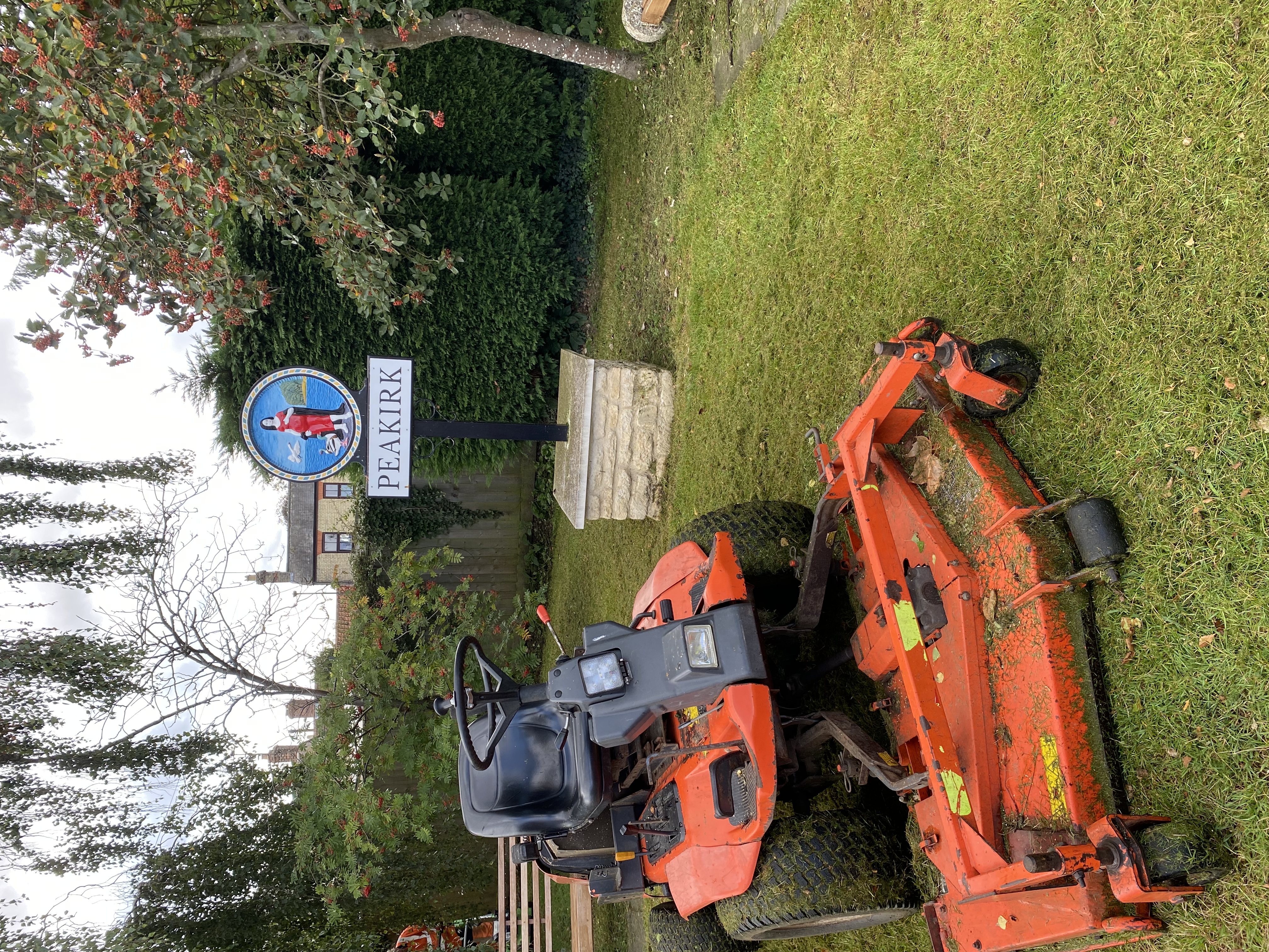 Grass cutting in Peakirk near Peterborough, Cambridgeshire